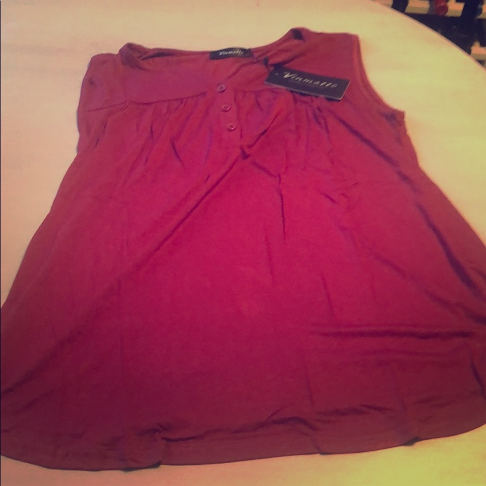 Women’s brand new sleeveless top